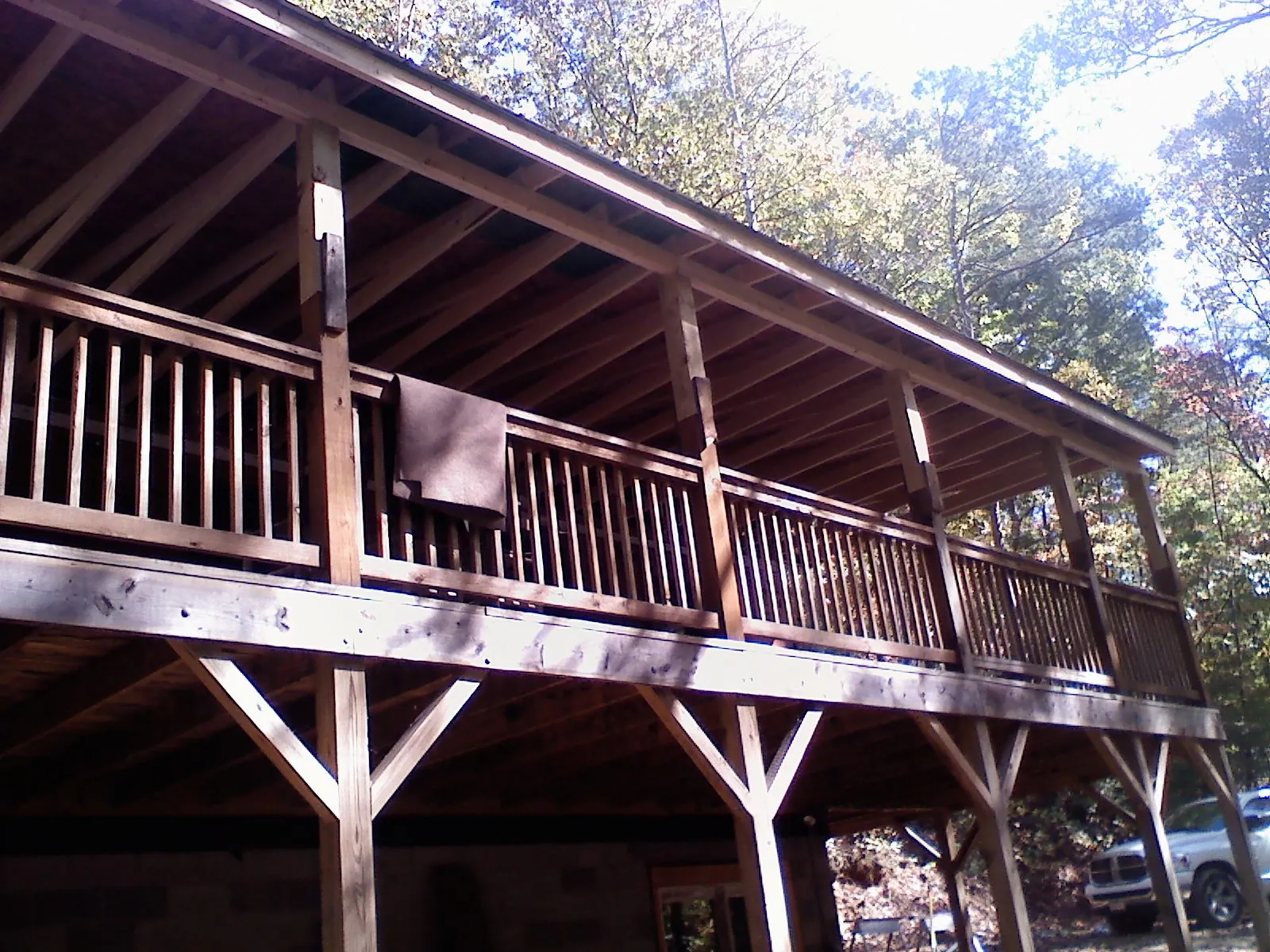 Timber framing under a new elevated porch and deck — Roof Leak Repair in Humble by Roofing Brothers